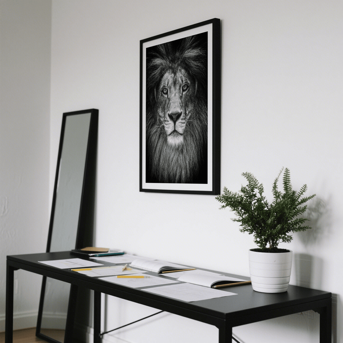 Dramatic wildlife art showing symmetrical lion head against dark background