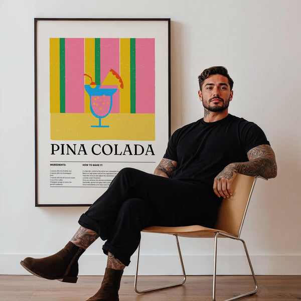 Bold cocktail print with a blue glass and fruit garnish, perfect for kitchen wall art.