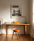 Typographic travel poster print featuring Tower Bridge photo and headline text for London decor
