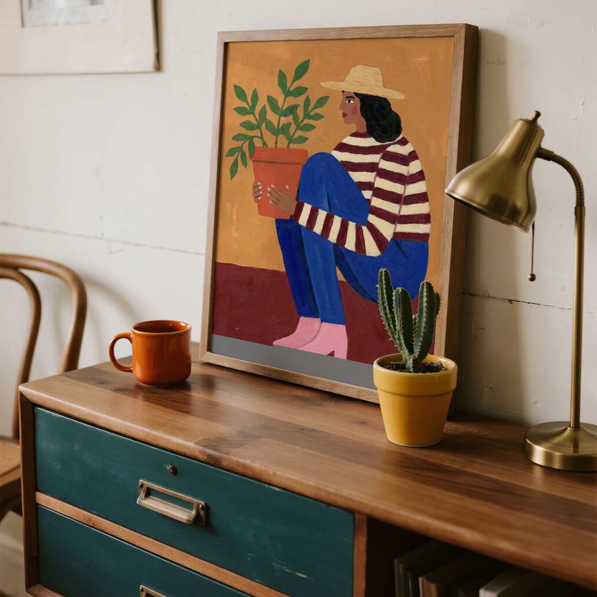 Close-up of Woman Plant Wall Art highlighting bold plant shapes around figure