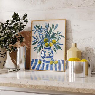 Olive tree wall art print styled for kitchen decor with cool coastal colors.