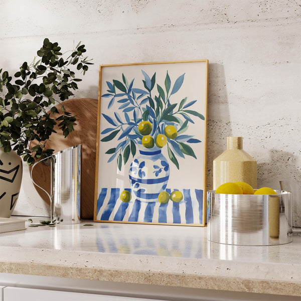 Olive tree wall art print styled for kitchen decor with cool coastal colors.