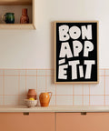 Elegant Bon Appétit poster with bold black typography
