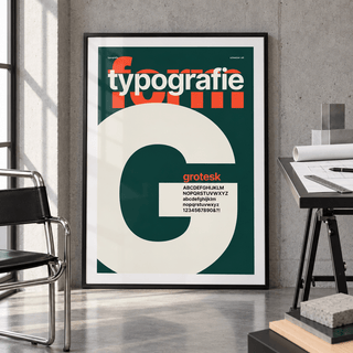 Giant letter G typography print in a modernist studio