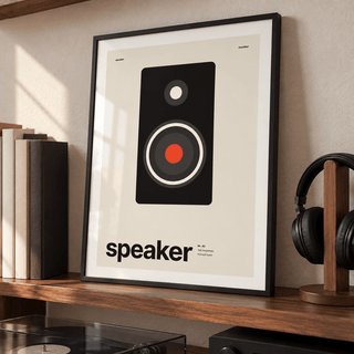 Black studio monitor speaker print leaning on a picture ledge in a music room