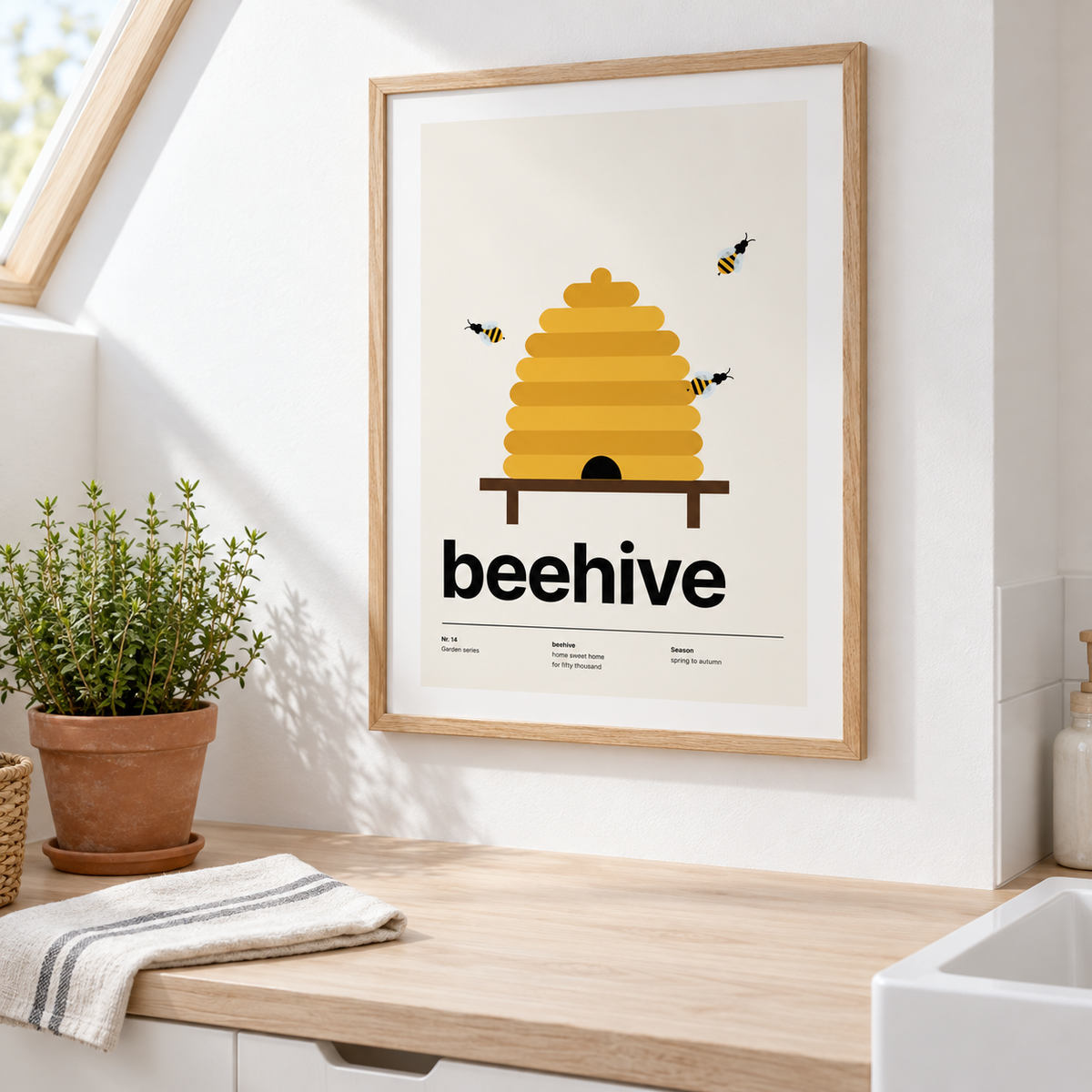 Beehive print above a kitchen counter by a window