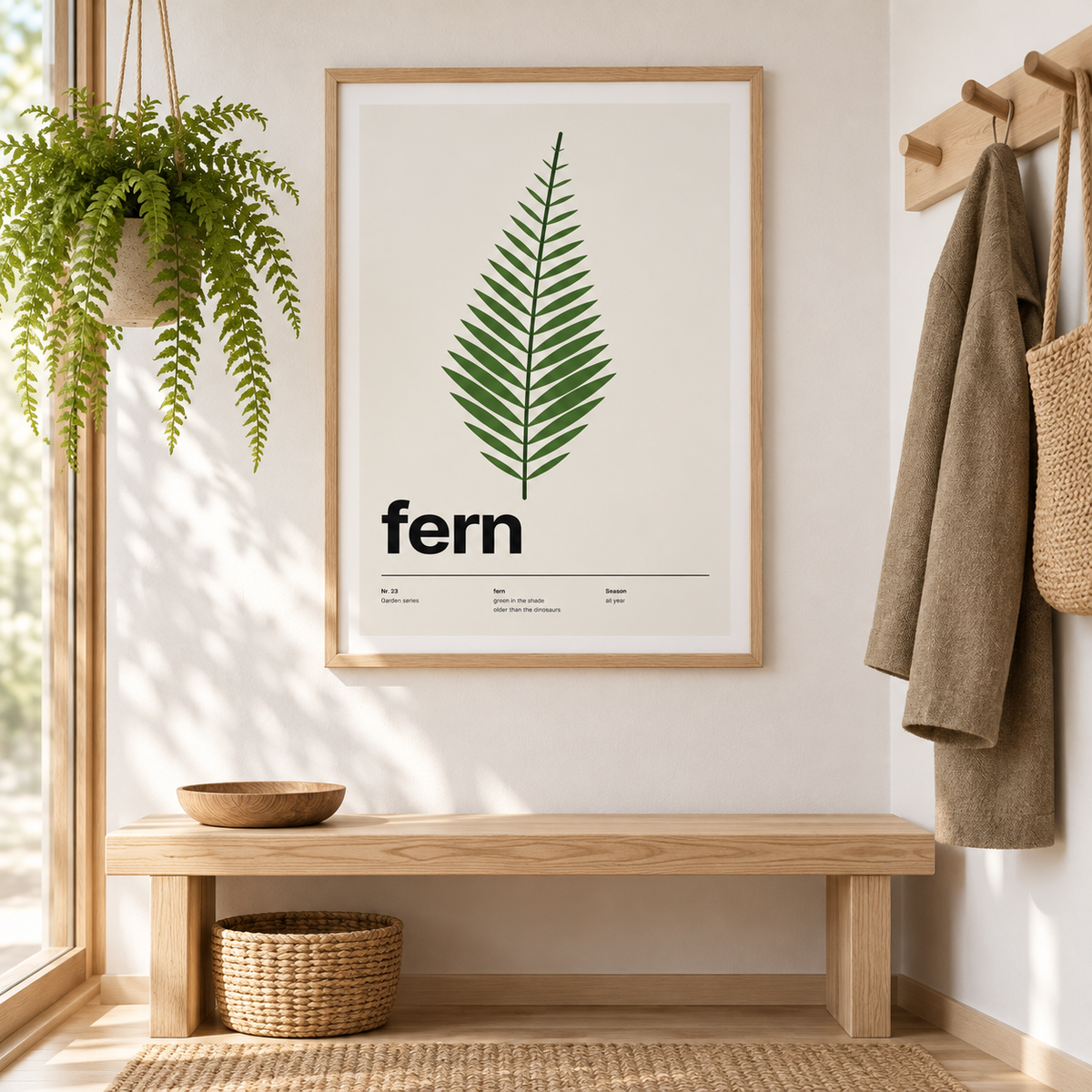 Fern print above a console in a green entrance hall