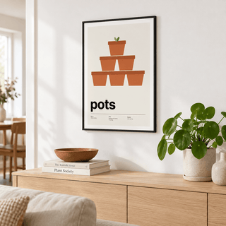 Terracotta plant pot print above a sofa in a light living room