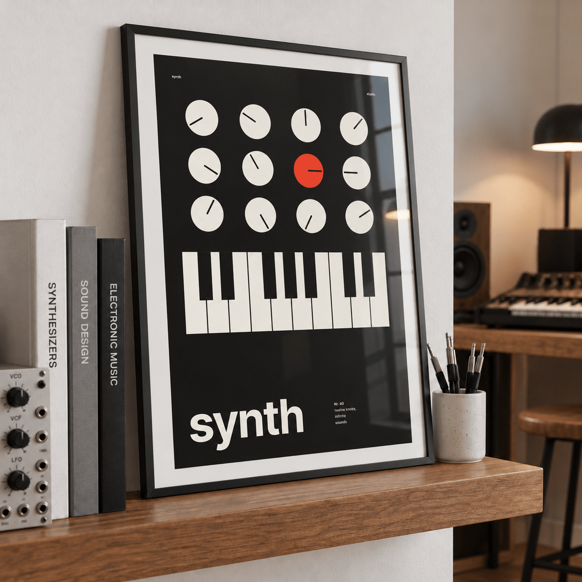 Synthesiser knobs and keys print leaning on a picture ledge in a music room