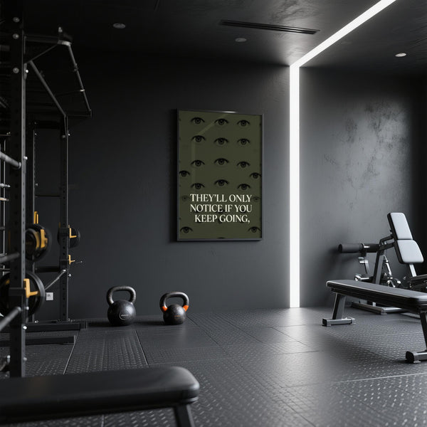Bold gym artwork print with surreal eyes and motivational saying