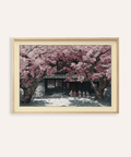 Framed view of Hasui Kawase cherry blossoms print hanging in a modern living room