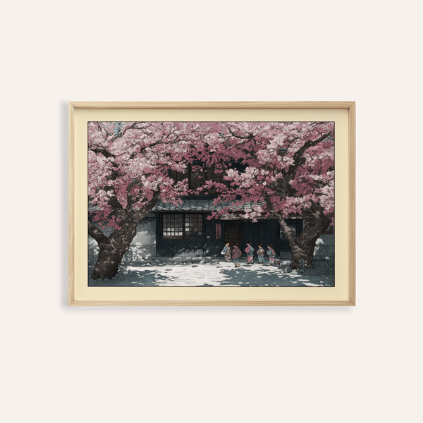 Framed view of Hasui Kawase cherry blossoms print hanging in a modern living room