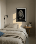 Black Leopard Wall Art poster featuring a stalking leopard in high-contrast black and white
