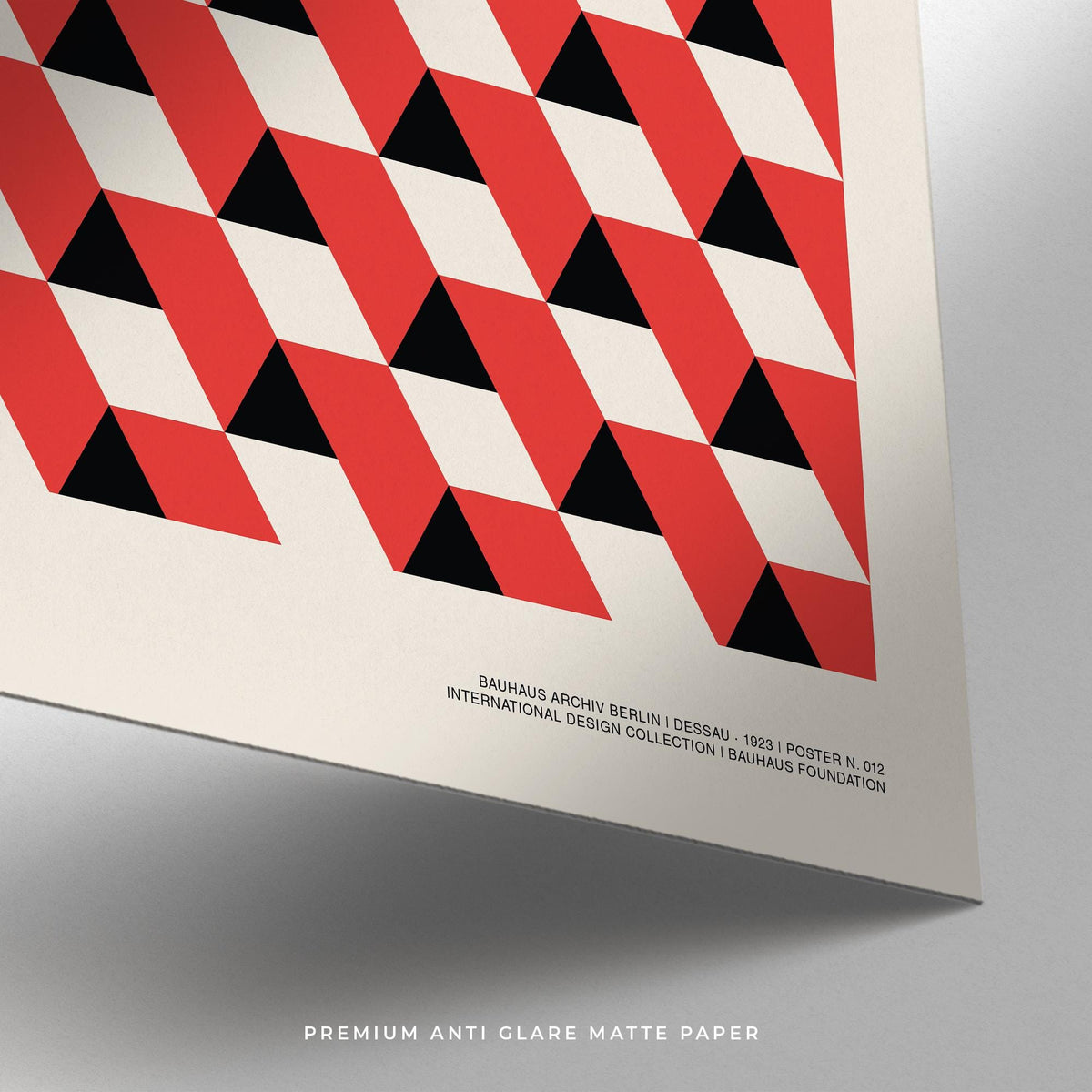 Bauhaus pictures with triangle motif styled in an office setting.
