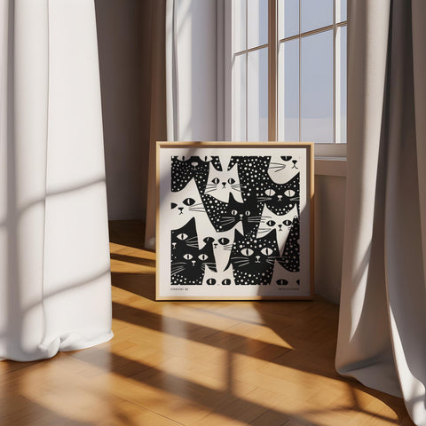 Japandi wall art featuring playful black and white cats.