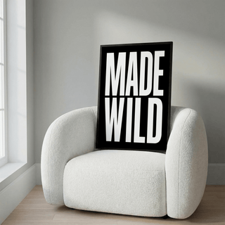 Living room mockup showing Made Wild Art Print in minimalist setting
