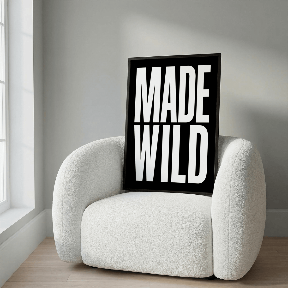 Living room mockup showing Made Wild Art Print in minimalist setting