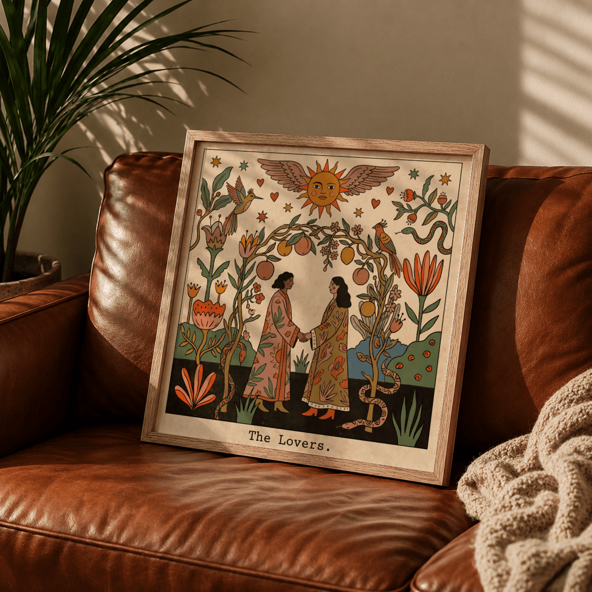 Folk illustration wall art print showing two people beneath sun with wings and scattered stars