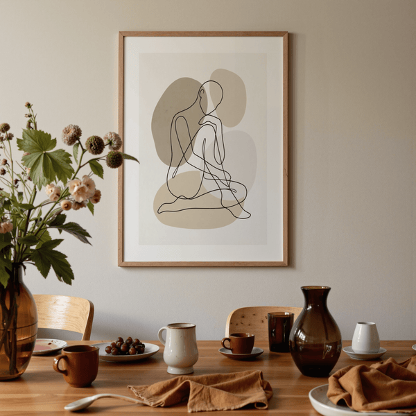 Seated outline art print with neutral gray, beige, and black palette