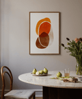 Abstract print of rounded shapes in warm oranges and cool grays