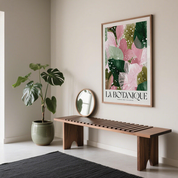 Framed high quality art prints in a bright hallway above a wooden bench.