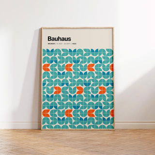 Graphic wall art with symmetric blue and orange modular design.