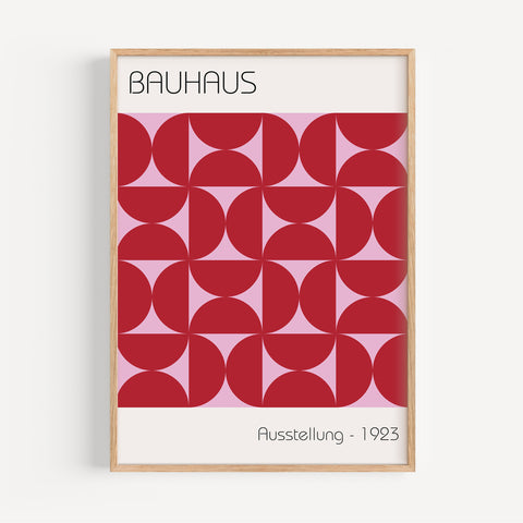 Bauhaus-inspired red and pink geometric wall art
