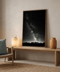 Space photography wall art capturing broad Milky Way band amid scattered stars in negative space