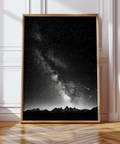 Black and white night sky poster showing meteor streak across detailed Milky Way dust lanes