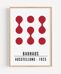 Red abstract wall art inspired by Bauhaus design for minimalist spaces
