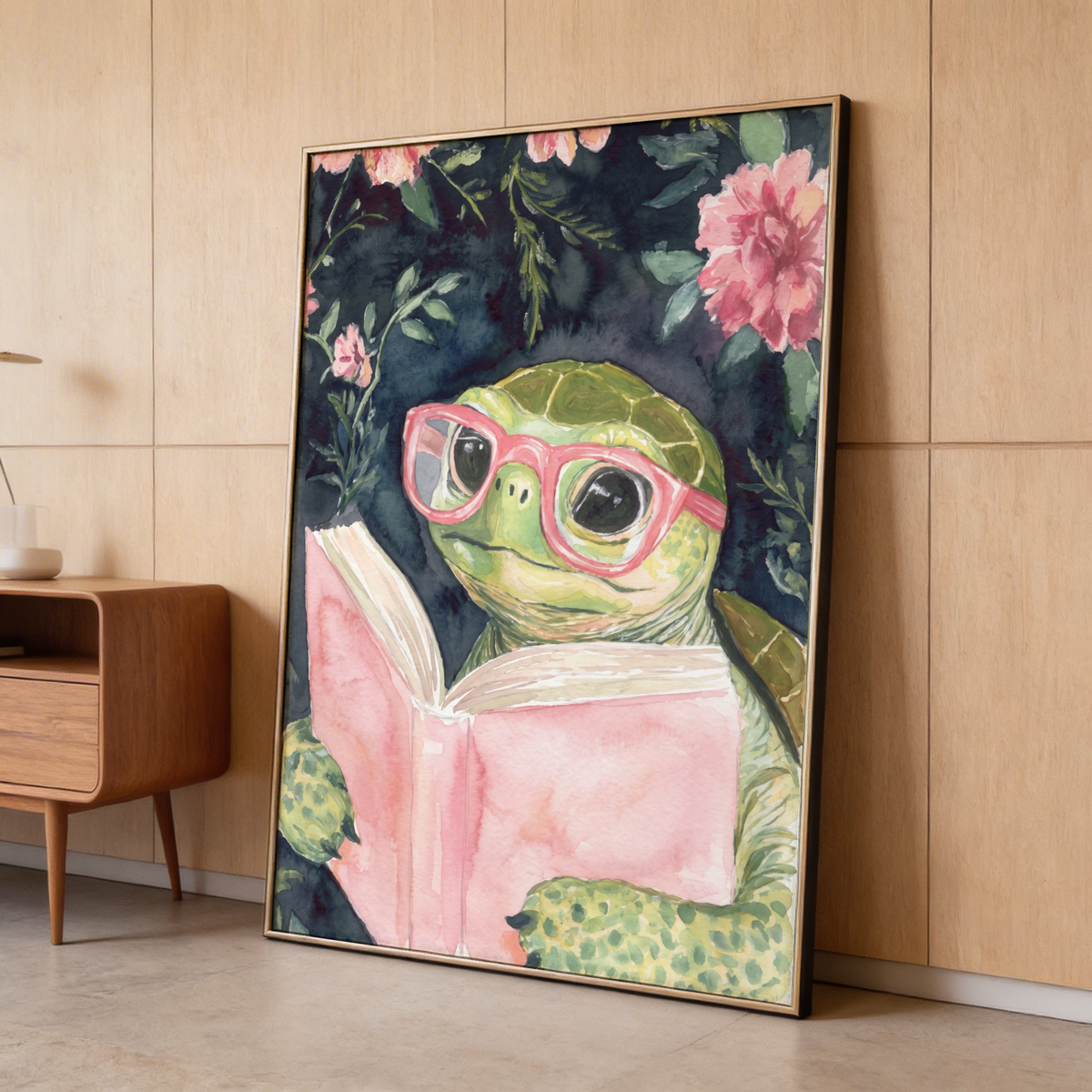 Illustrated animal poster of a turtle reading with flowers and leafy stems around the scene