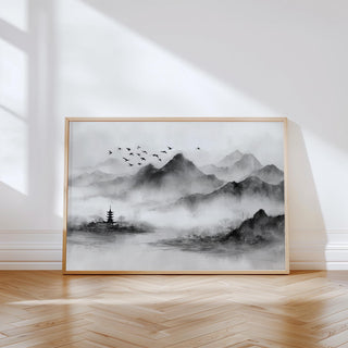 Black and white landscape print of misty mountains with birds flying over a pagoda.