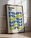 Modern Office Wall Decor featuring Bauhaus shapes in blue and lime green on cream.
