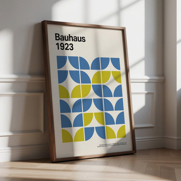 Modern Office Wall Decor featuring Bauhaus shapes in blue and lime green on cream.