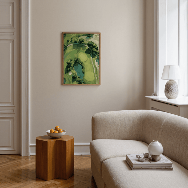 Overhead fairway print poster showing curved green, trees, and bunkers