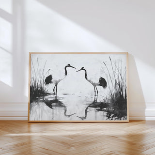 Minimalist bird print featuring two cranes in black and white with water reflections.