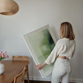 Modern color field composition shown in olive green wall art.