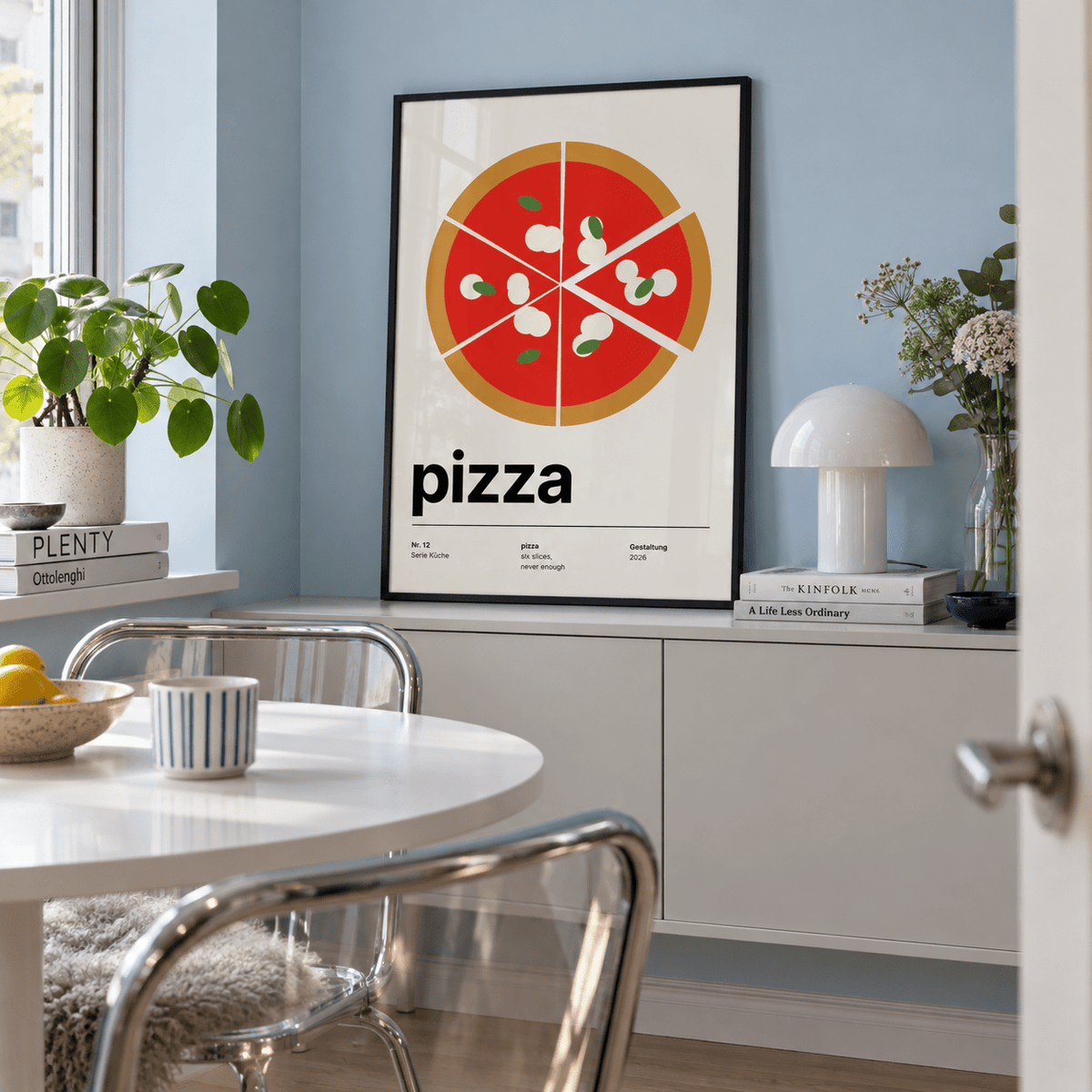 Sliced pizza with one slice pulled out print in a dining alcove against a blue wall