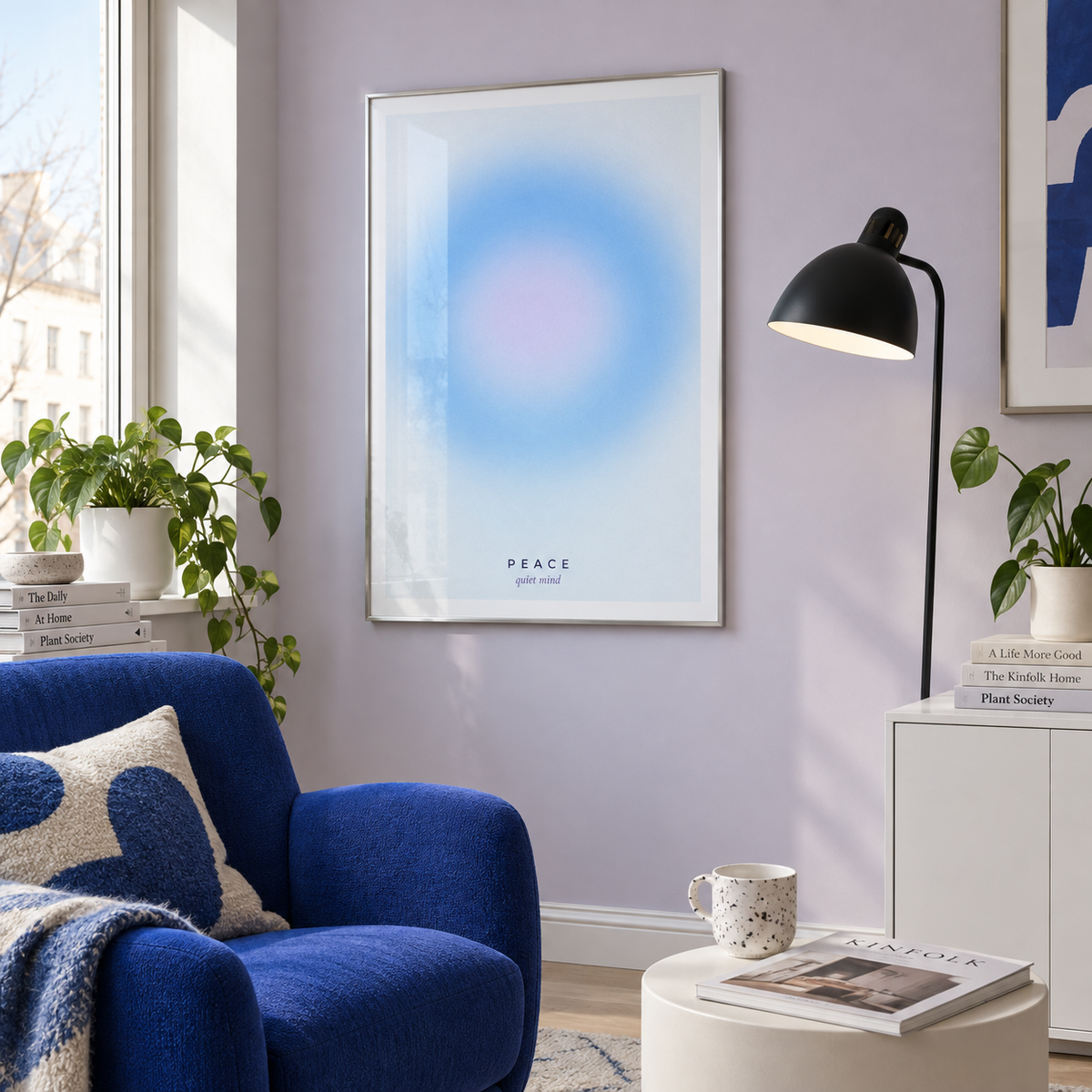 Soft sky blue halo gradient print in a reading space against a lilac wall