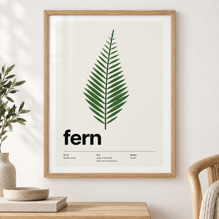 Close view of the single green fern frond showing the fine print detail