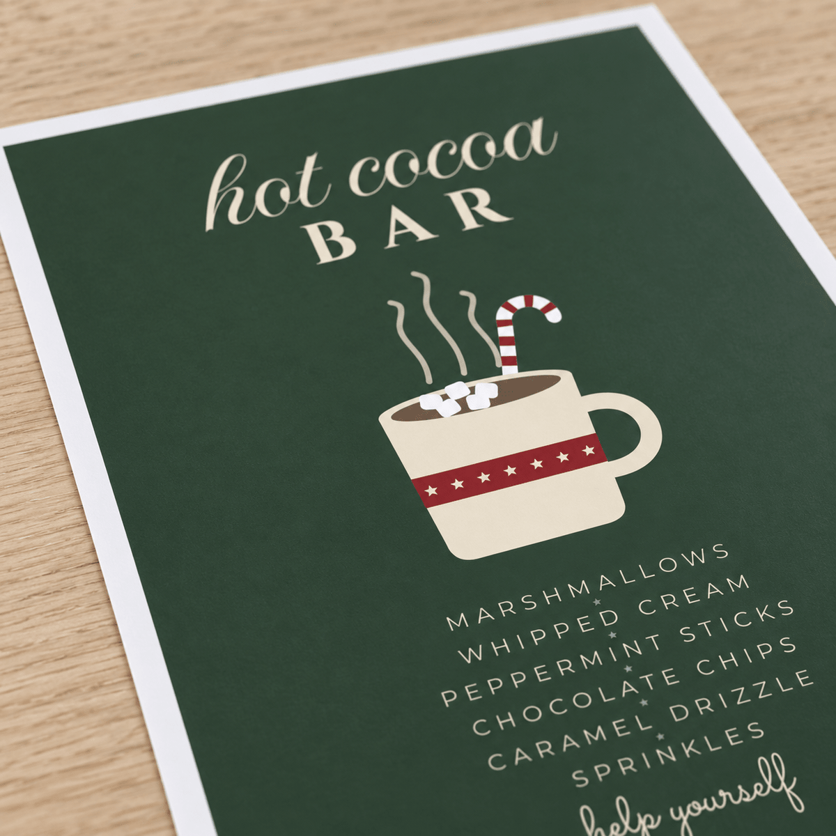 Close view of the festive cocoa toppings print showing the paper texture and lettering