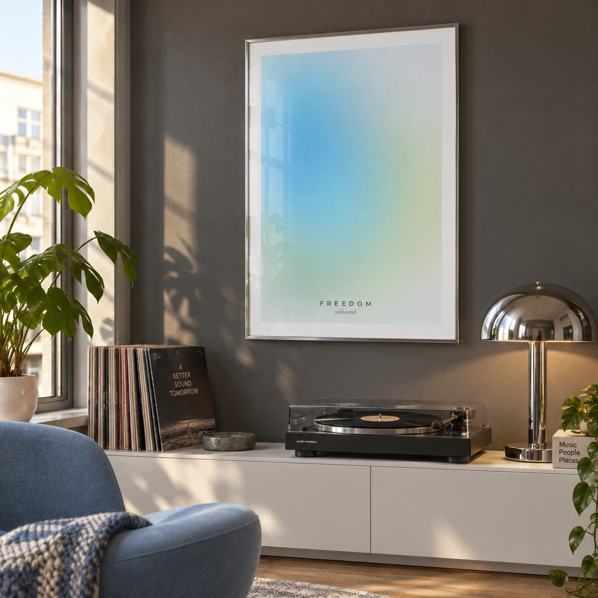 Airy blue and yellow aura print in a music corner against a graphite wall