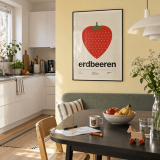 Red strawberry with leafy top print in a family kitchen against a yellow wall
