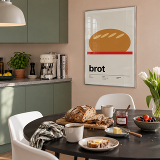 Swiss style bread kitchen print in a dining area against a sage wall