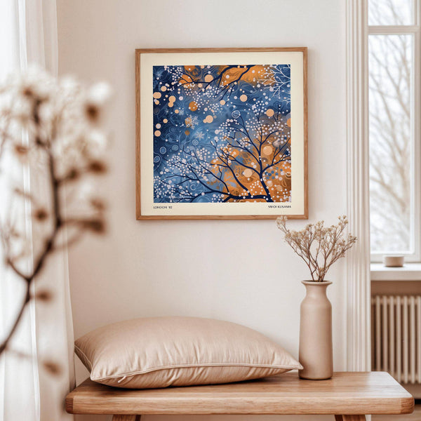 Modern winter scene wall art in cool blue and warm orange tones
