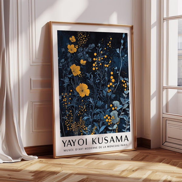 Orange and blue wall art with vibrant floral forms on a dark background