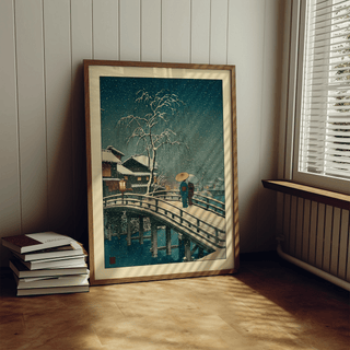 Gallery wall arrangement featuring Japanese bridge artwork among other prints