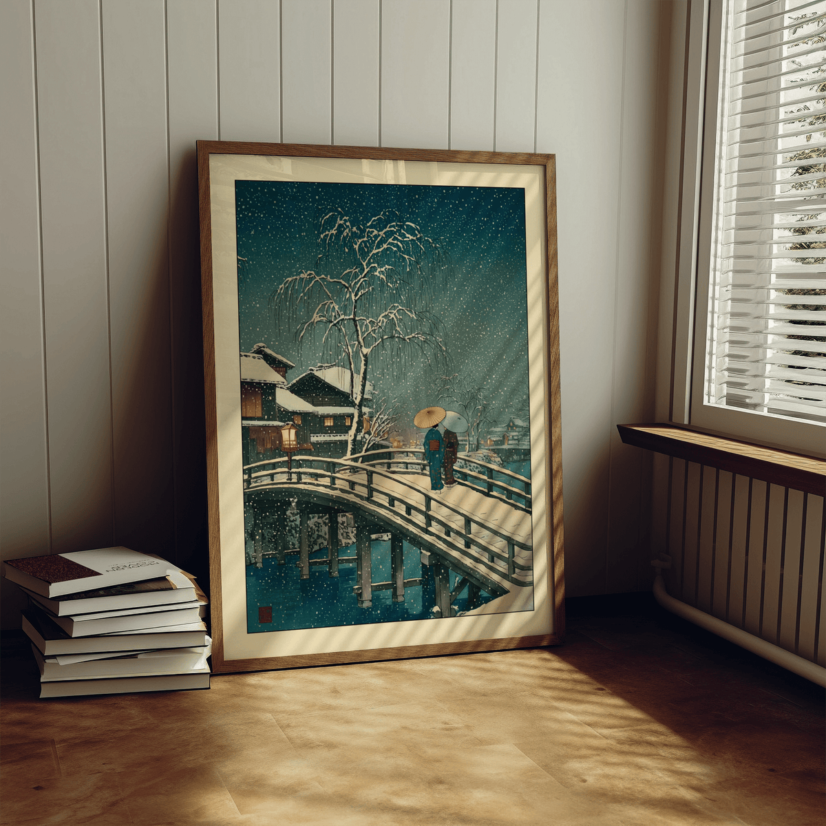 Gallery wall arrangement featuring Japanese bridge artwork among other prints