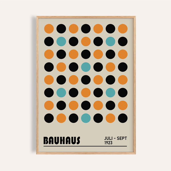 Geometric wall decor with Bauhaus-inspired black and orange dots