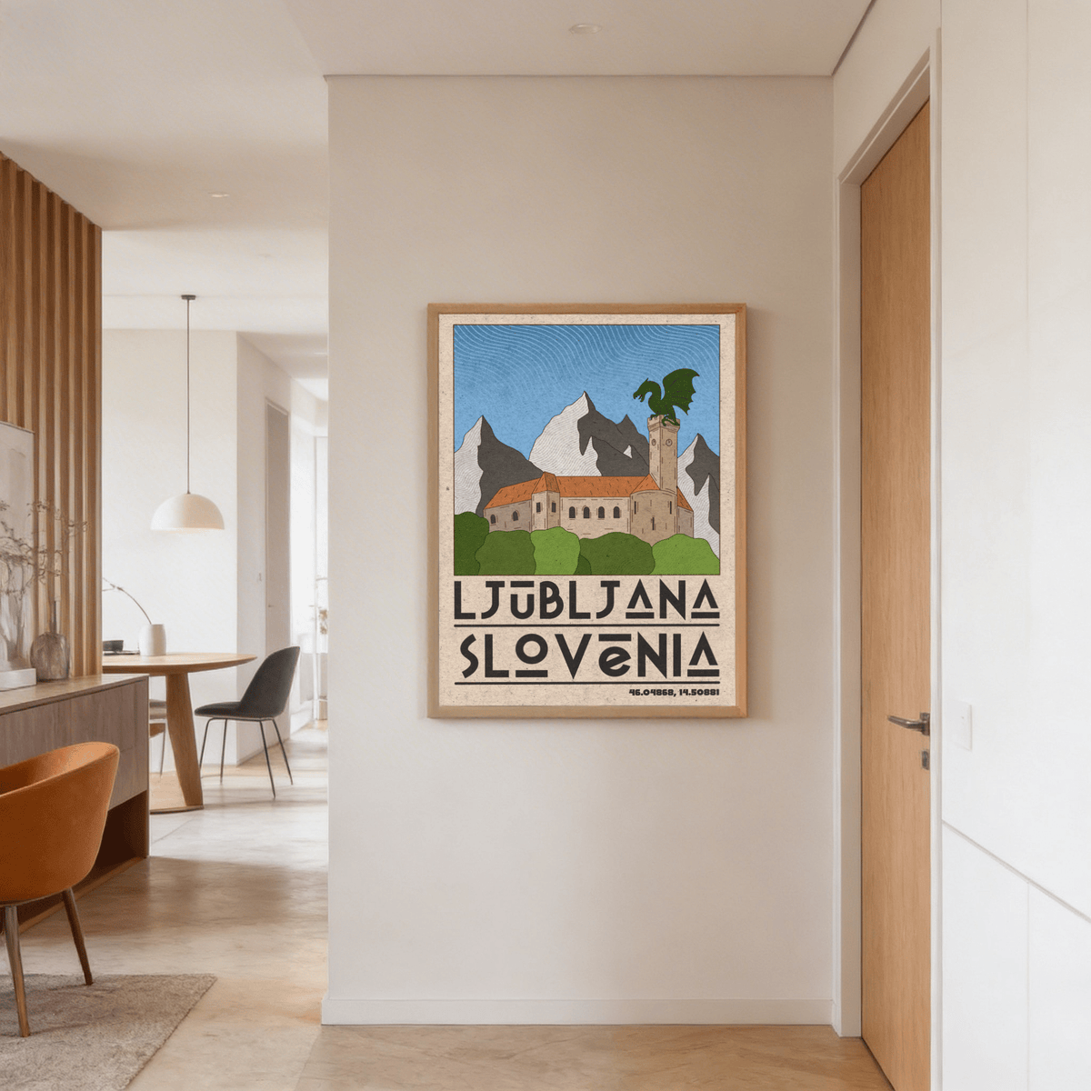 Graphic city wall art depicting stone building, orange roof and alpine backdrop